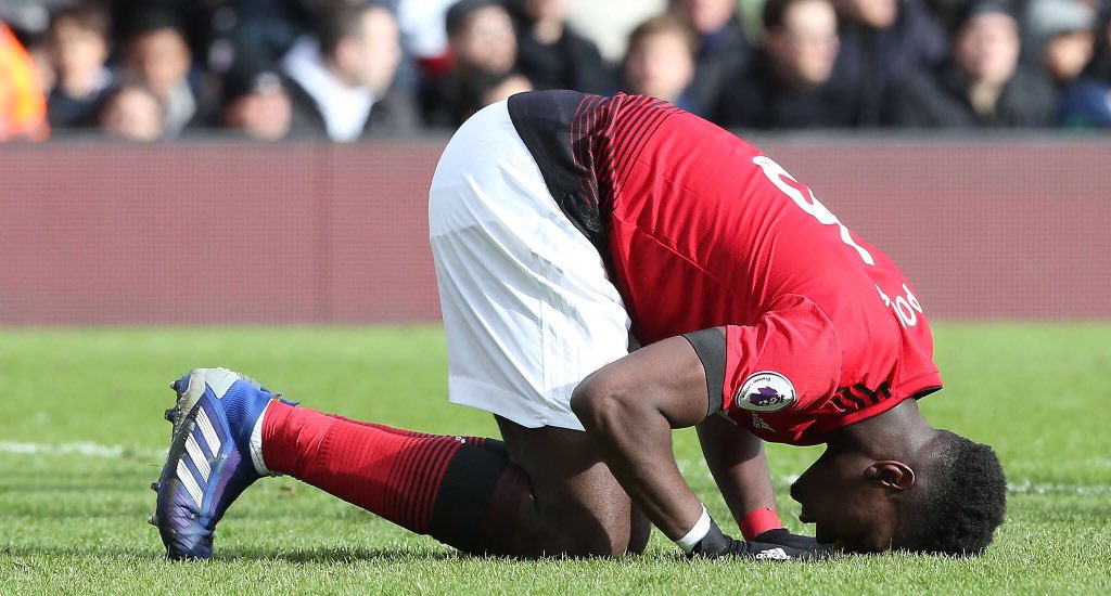 Paul Pogba prostrating after scoring for Manchester United